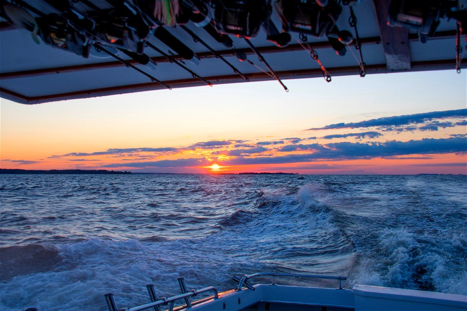 Wide Angle Photo Of Body Of Water During Sunset photo