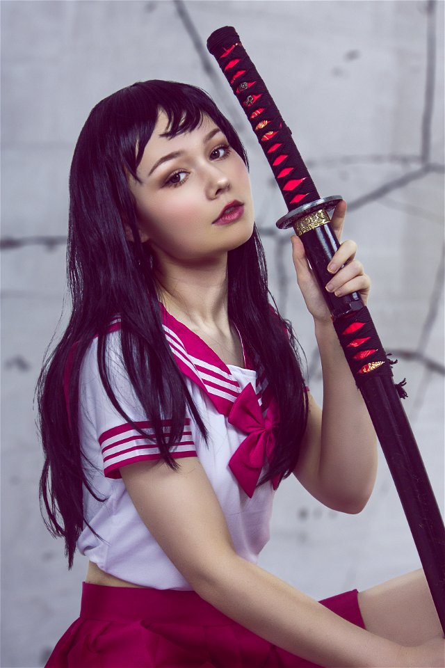 Black Hair Woman Holding Black Katana photo