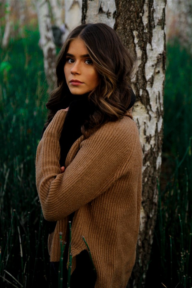 Woman Standing Beside Tree photo