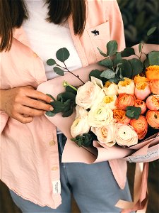 Person Holding Bouquet Of Flower