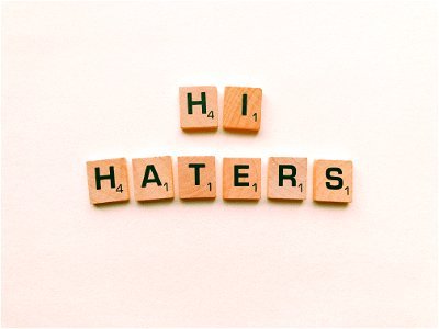Hi Haters Scrabble Tiles On White Surface photo