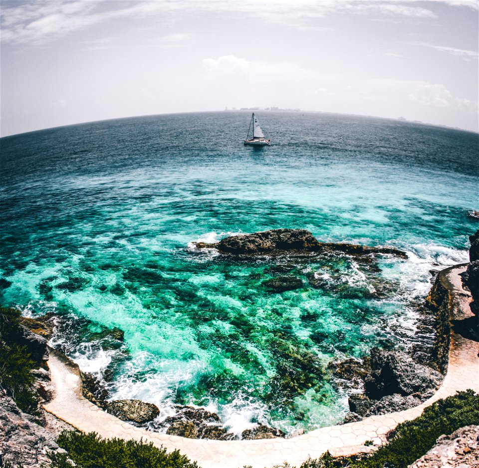 White Sailboat On Sea Water Fish-eye Photo photo