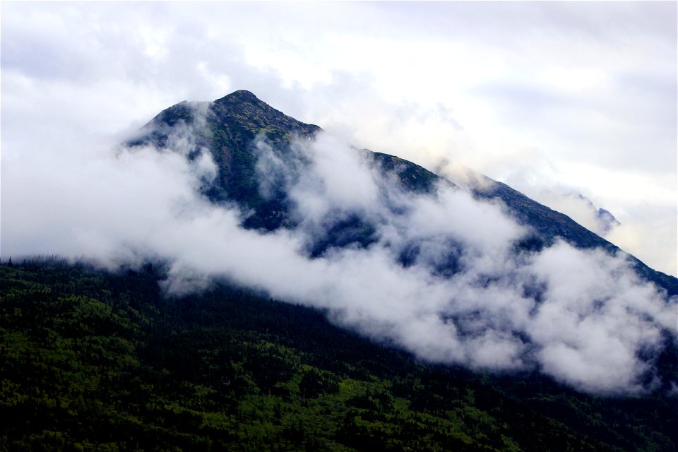 White Clouds Over Black Mountain
