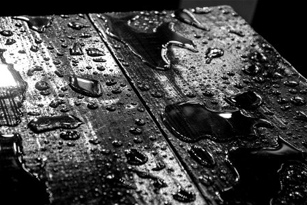 Water Drops On Black Board photo