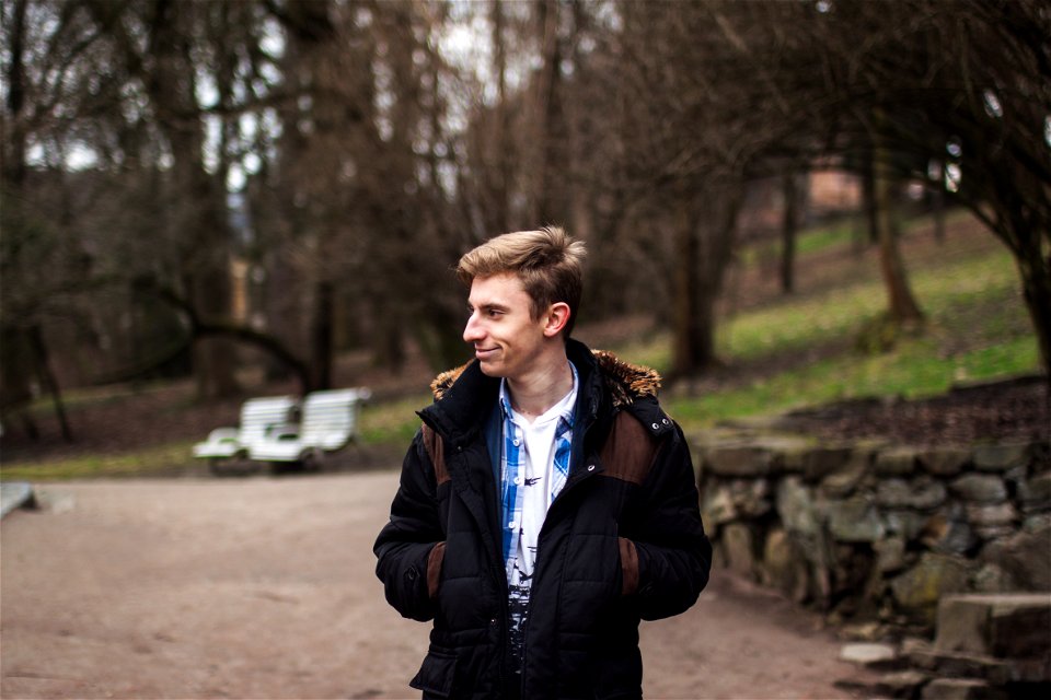 Photography Of A Man Wearing Black And Brown Jacket