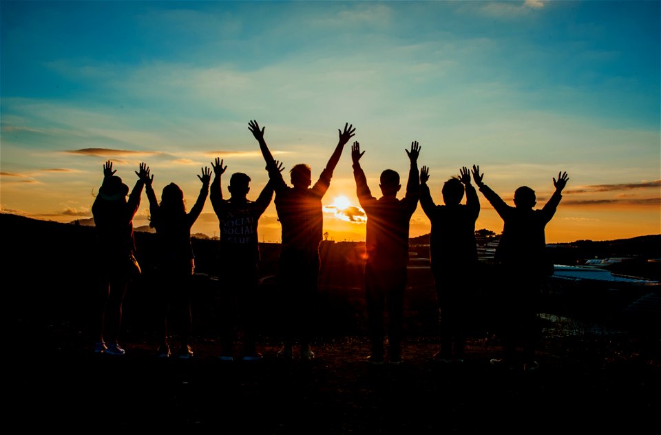 People Silhouette During Sunset photo