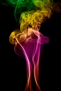 Multicolored smoke swirls photo