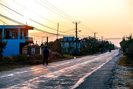 Street Through Town At Sunset