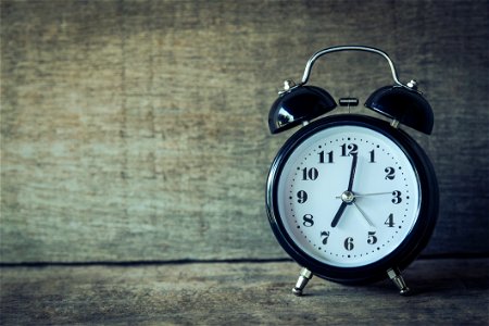 Alarm Clock On Rustic Wood photo