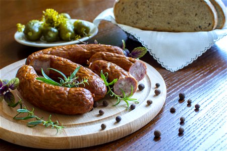 Sausages On Cutting Board photo