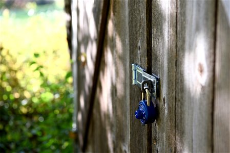 Combination Lock On Wooden Door photo