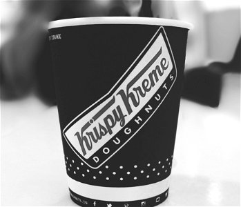 Krispy Kreme Doughnuts Cup Of Coffee photo