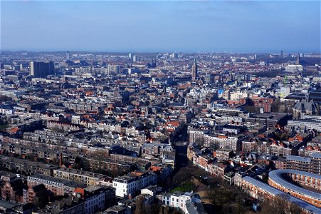 Aerial View Of The City Under Blue And White Cloudy Sky photo