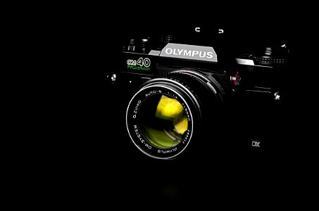 Black Olympus Slr Camera photo