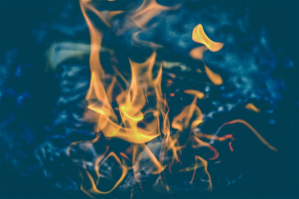Yellow Flame On Clear Water