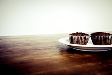 Brown Cupcake On White Ceramic Plate photo