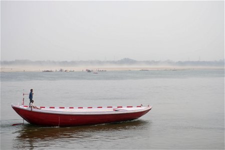 Two Men in a Red Boat photo