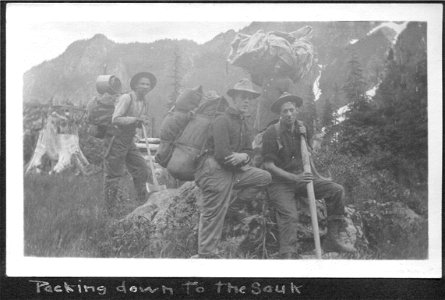 Packing down Sauk River 1912-14 photo