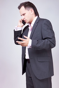 Businessman talks with expression photo