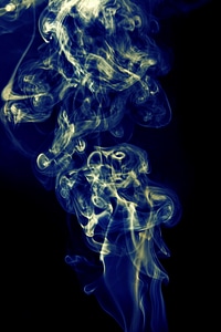 Abstract blue smoke swirl photo