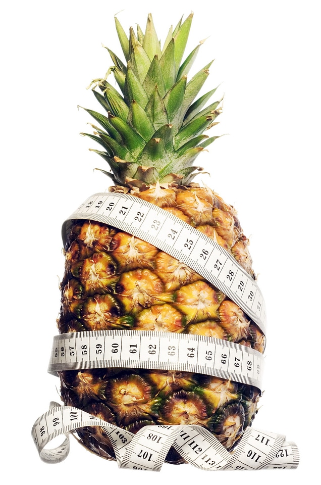 Measuring tape on pineapple