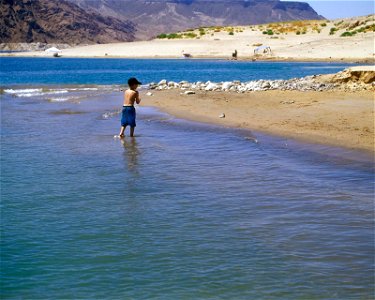 a young boy takes advantage of a beach area at Lake Mead photo