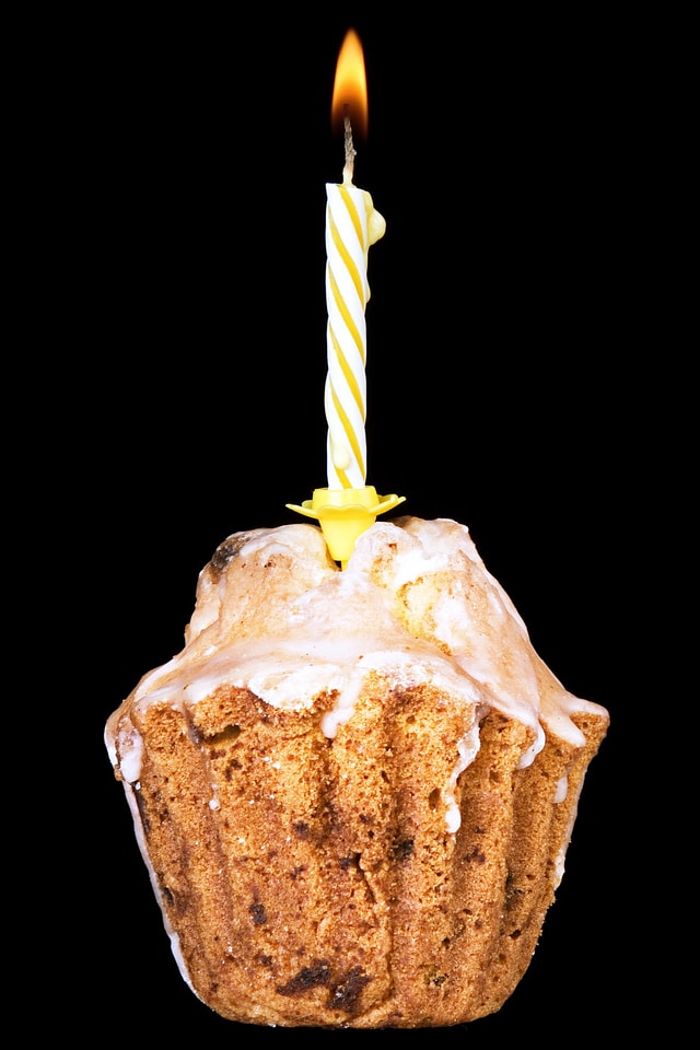 Cupcake with burning candle