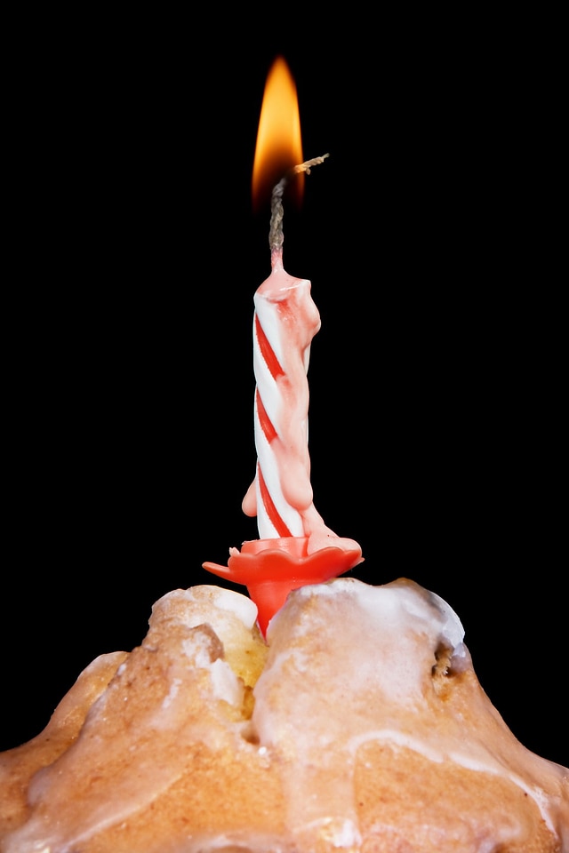 Cupcake with burning candle