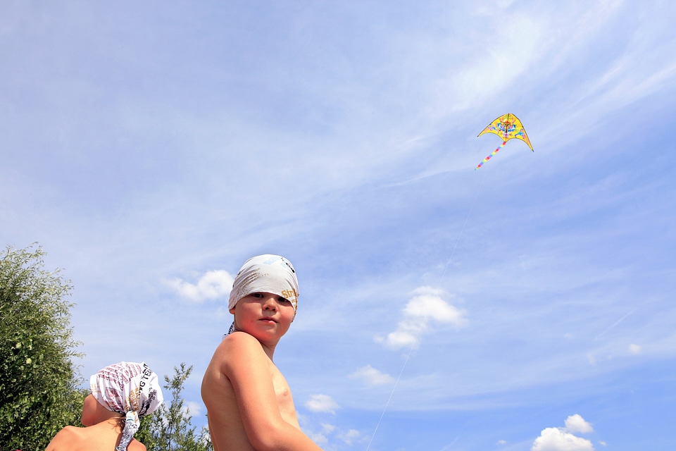 boy plays kite photo
