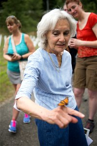 Marge Alia releases a Monarch Butterfly during a butterfly release with Monarch Teacher Network in Arlington National Cemetery, Aug. 9, 2016, in Arlington, Va. The cemetery plants several types of loc