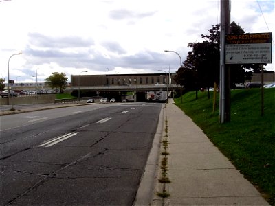 Looking westward, Allen Road and a portion of the Toronto Transit Commission's Wilson station span Wilson Avenue east of Dufferin Street in Toronto, Ontario, Canada. The sign in the foreground is a no