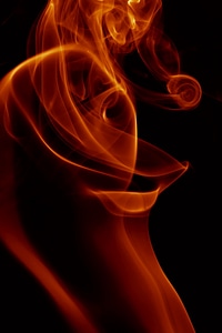 Swirly orange smoke background photo