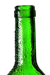 Wet green glass bottle photo