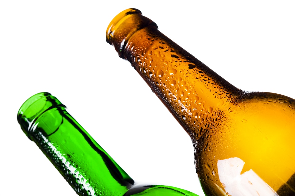 Two Wet Glass Bottles