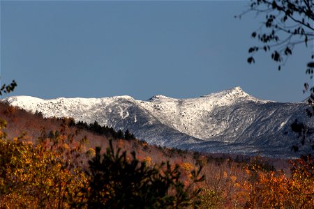 Snowy Mountain and Autumn Foliage photo