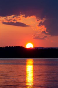 Orange Sunset on a Still Lake photo