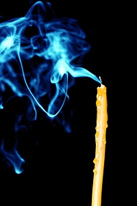 Blue smoke and candle