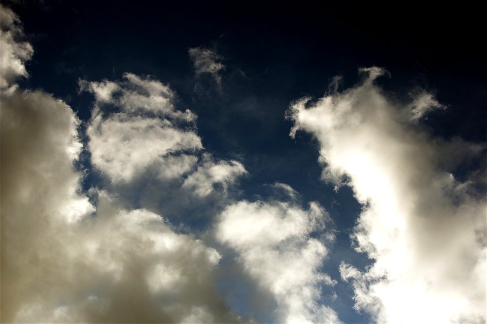 Bright Clouds on Dark Sky photo