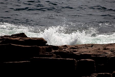 Crashing Ocean Wave on Rocks photo