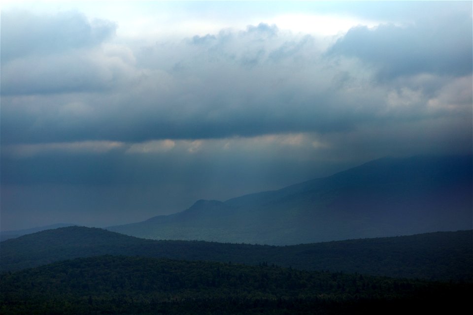 Storm Passing Over Hills photo