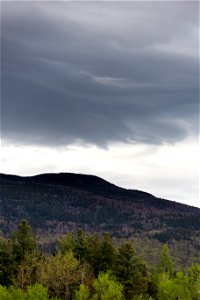 Grey Clouds Over Springtime Mountain photo