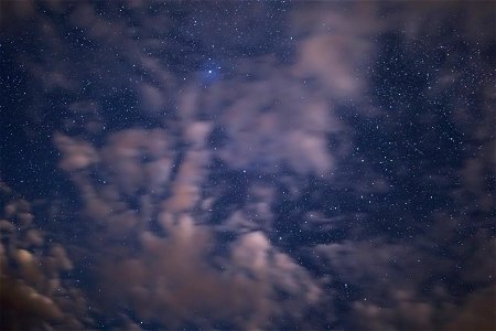 Stars Peeking Through Thin Pink Clouds photo