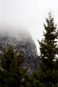 Sheer Rocky Mountainside in the Mist photo
