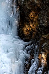 Frozen Waterfall on the Rocks photo