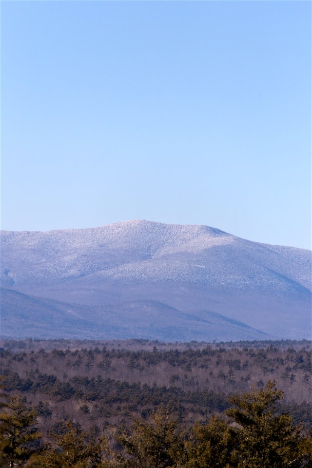 Snow Dusted Mountain Range in the Distance photo