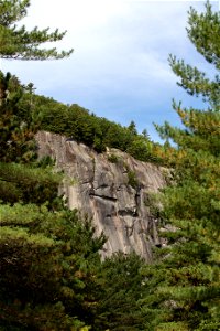 Sheer Rocky Cliff in Summer photo