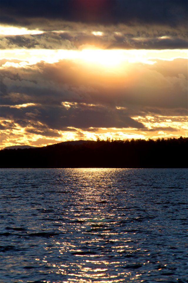 Summer Sunset Over Water photo