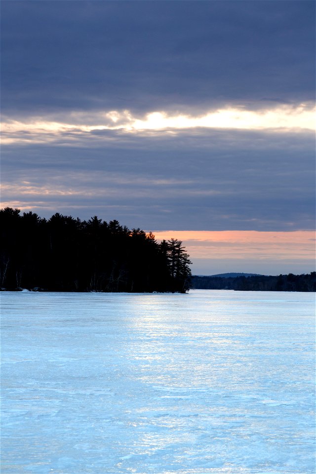 Frozen Lake with Land in View photo