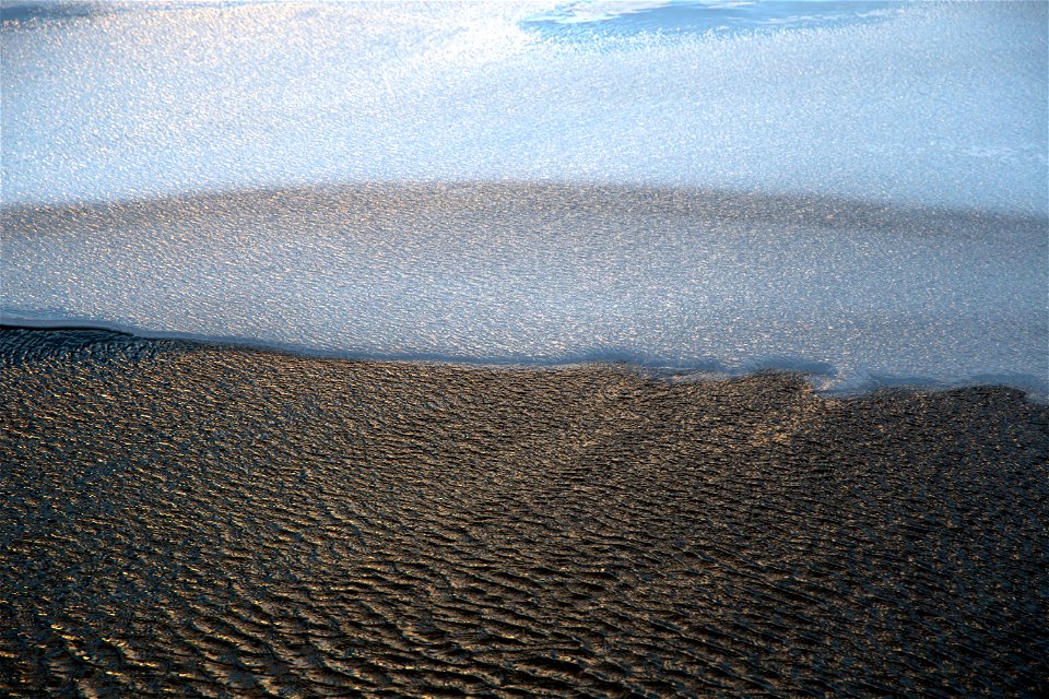 Delicate Water Ripples and Ice photo