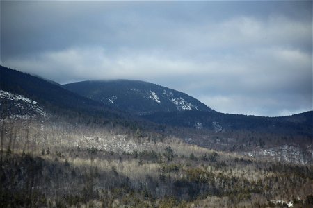 Cloud Cover Over Winter Mountains photo